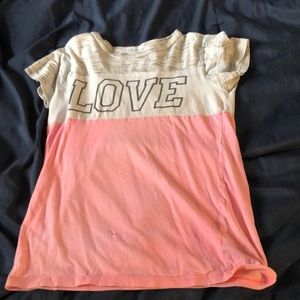 White and pink kid shirt